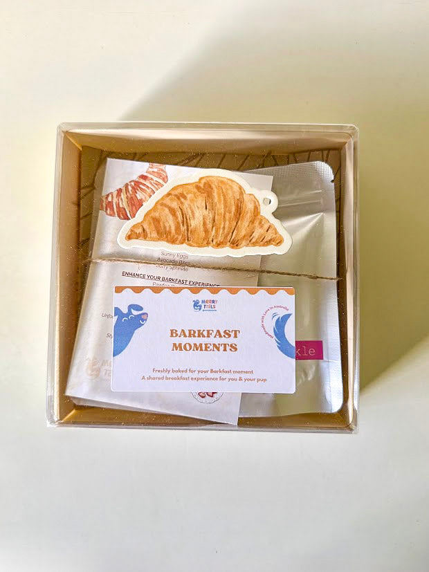 Barkfast Moment breakfast box with handmade breakfast-inspired dog treats, menu card and placemat.