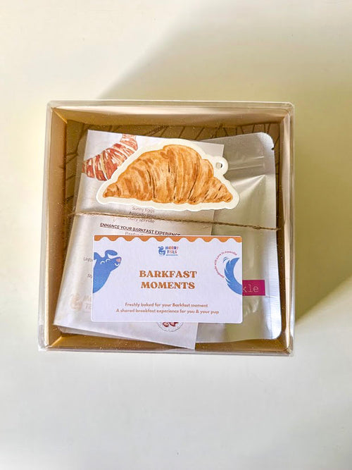 Barkfast Moment breakfast box with handmade breakfast-inspired dog treats, menu card and placemat.