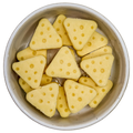 Soft goat milk and cheese dog treats shaped like cheese wedges, perfect for Barkfast, enrichment bowls and everyday rewards.