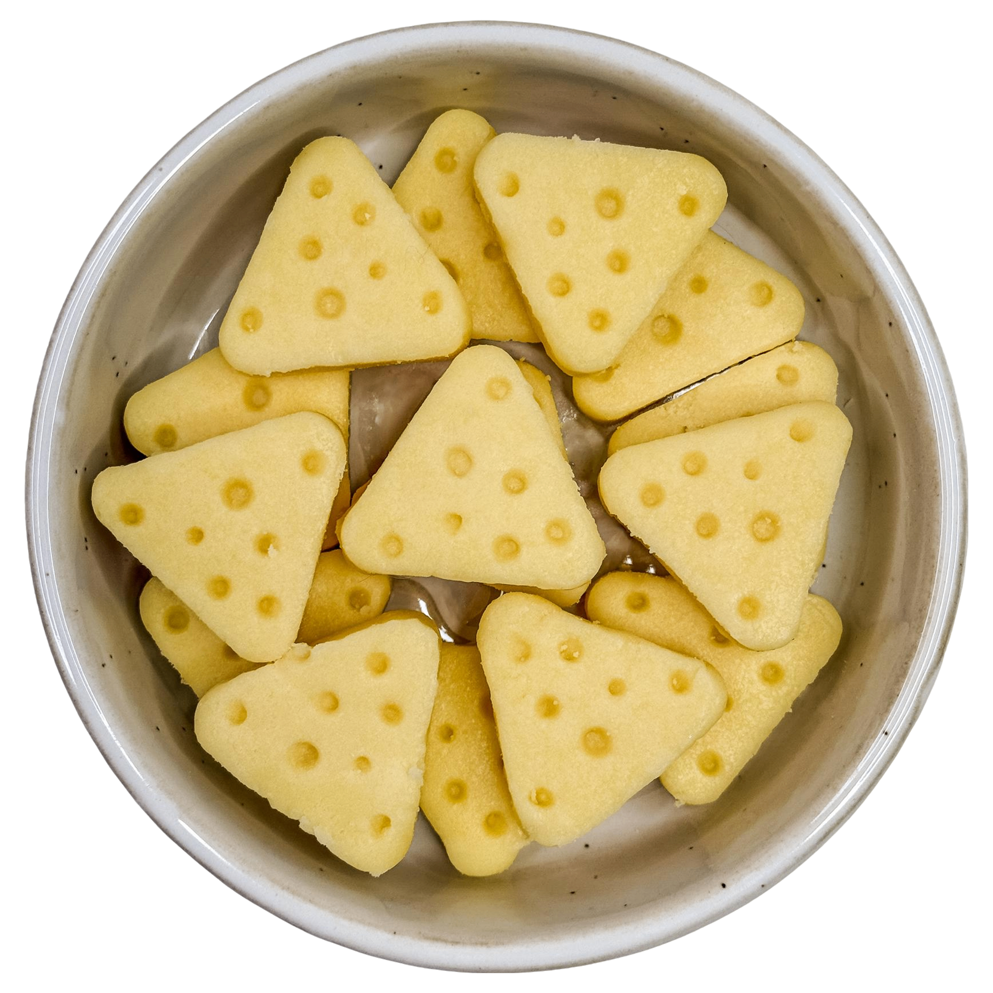Soft goat milk and cheese dog treats shaped like cheese wedges, perfect for Barkfast, enrichment bowls and everyday rewards.