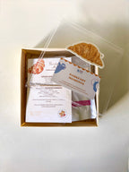 Inside Barkfast Moment showing breakfast-inspired dog treats, Berry Sprinkle, menu card and placemat.