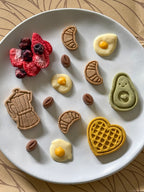 Pawfee Beans paired with Barkfast favourites including croissants, waffles, avocado bites, sunny eggs and berry sprinkle.