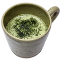 Café-inspired Matcha Latte for dogs served in a ceramic mug, handcrafted by Hill & Hound.
