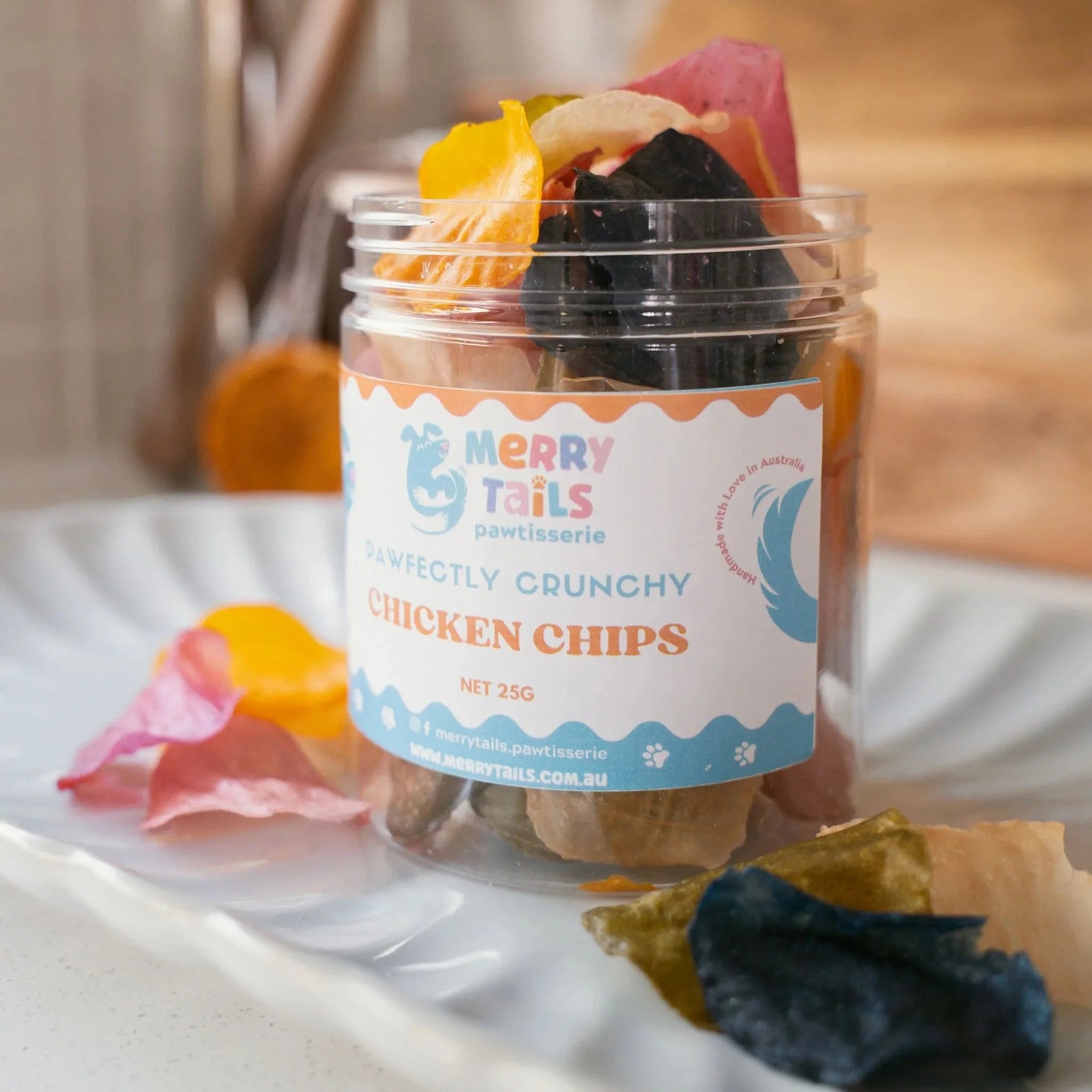 Close-up of a jar of crunchy chicken dog treats displayed on a kitchen counter