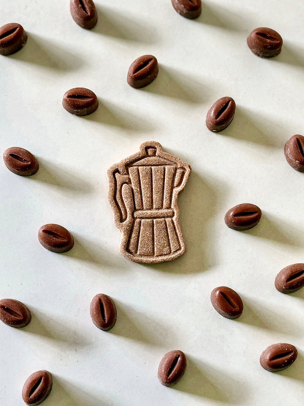 Pawfee Beans for dogs featuring unsweetened carob yoghurt and a handcrafted moka pot biscuit for a café-inspired Barkfast experience.
