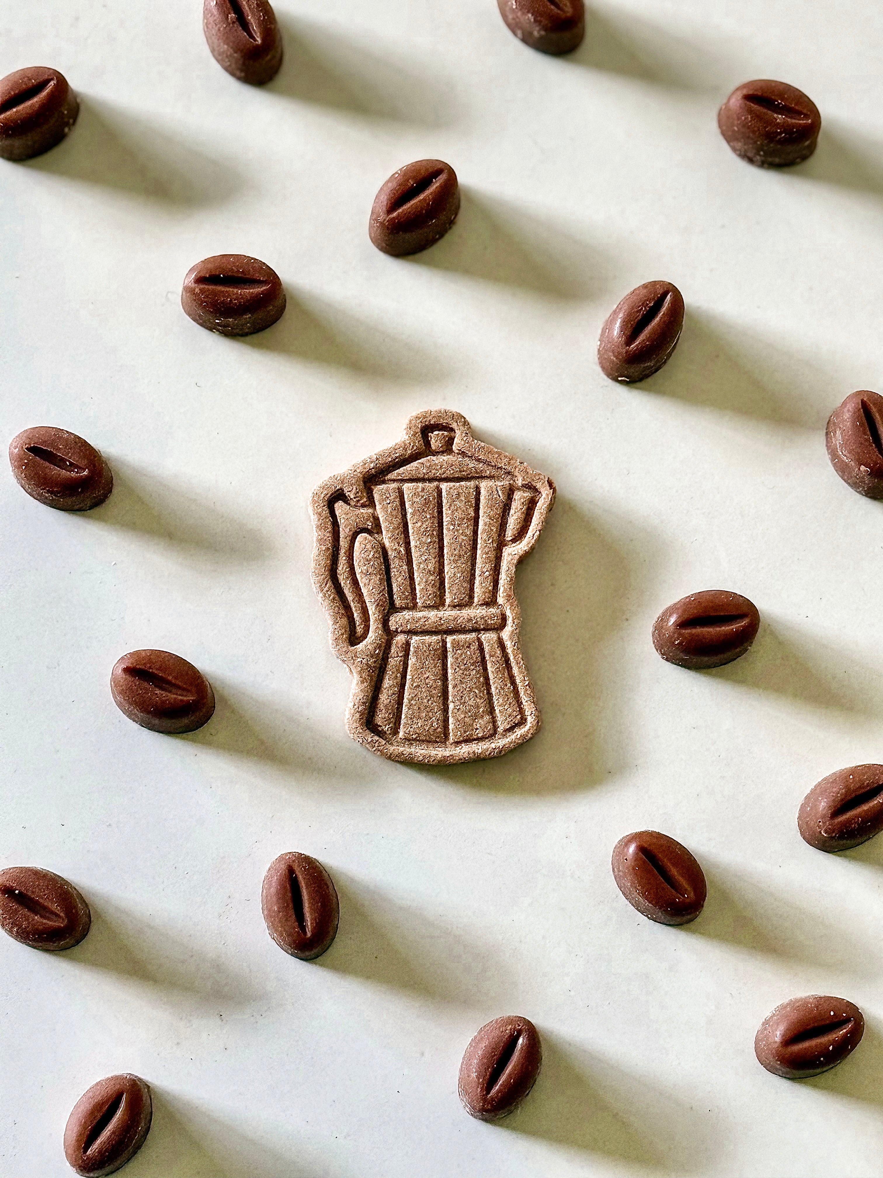 Pawfee Beans for dogs featuring unsweetened carob yoghurt and a handcrafted moka pot biscuit for a café-inspired Barkfast experience.
