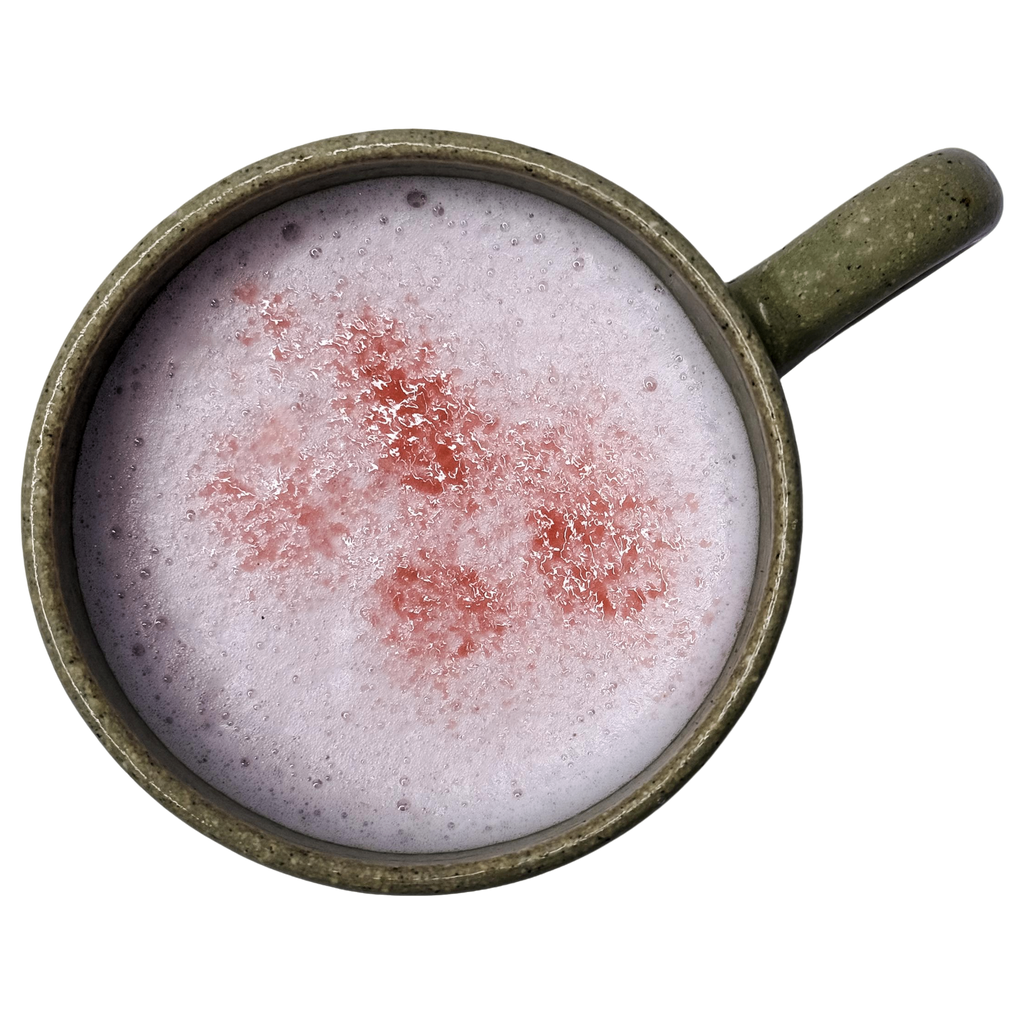 Prepared Sakura Latte for dogs made with goat milk and natural strawberry and pink pitaya.