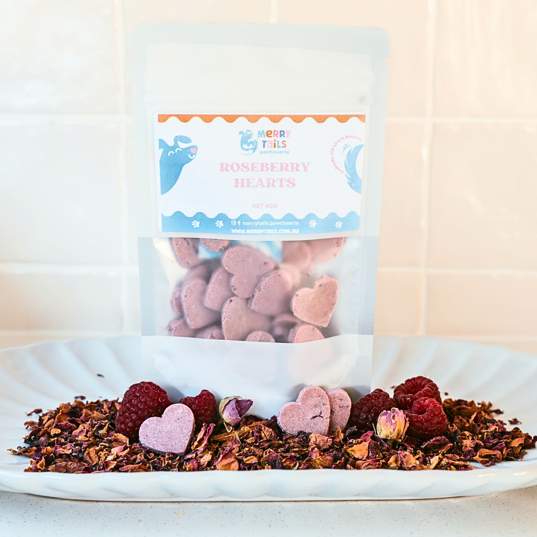 All natural handmade Roseberry Hearts raspberry and rose dog treats in packaging
